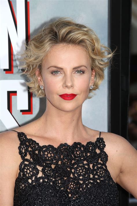 charlize theron blonde curls.